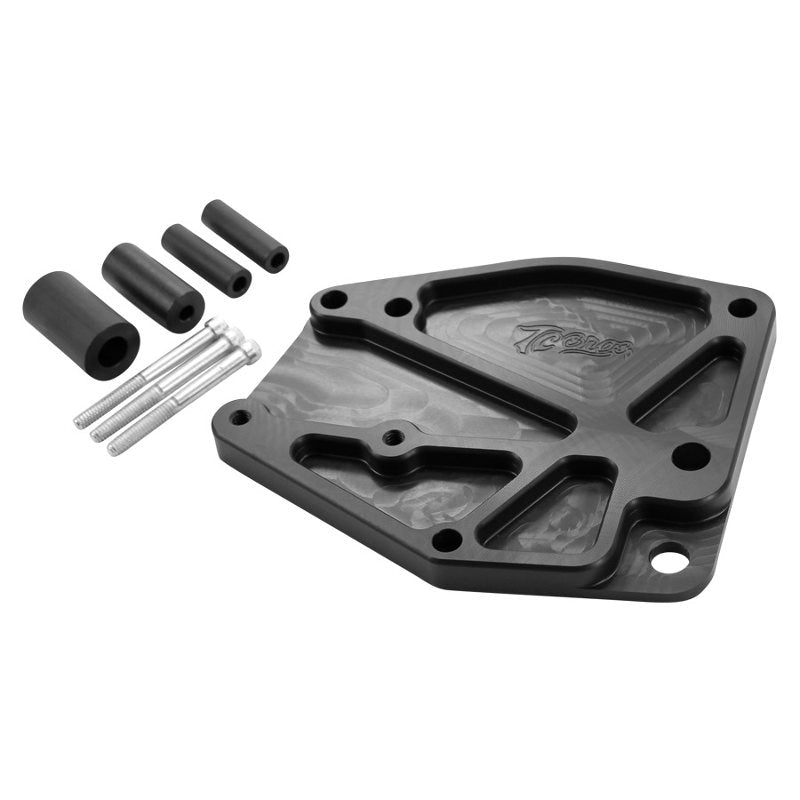 A TC Bros. Billet Sprocket Cover for 86-03 Sportster - Black plate with screws and bolts.