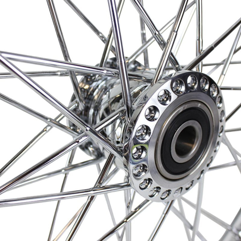 A close up image of a Moto Iron® Chrome Front 40 Spoke Spool Wheel Hub fits 3/4 Harley Axle, featuring a CNC machined triple chrome plated hub.