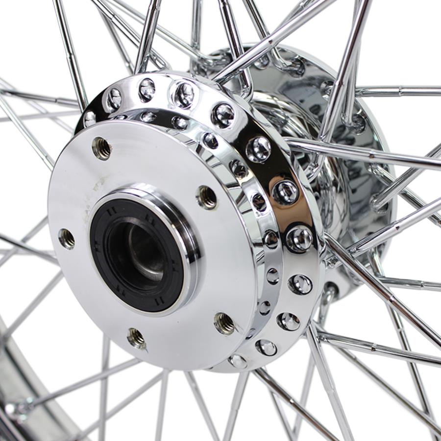 A close up of a Moto Iron® Chrome Front 40 Spoke Wheel 19" X 2.15" with a billet hub.