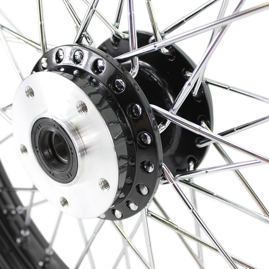 A close up of a Moto Iron® Black Front 40 Spoke Wheel 19" X 2.15" (fits Harley FX, Sportster 1984-1999) Billet Hub on a Harley FX and Sportster motorcycle.