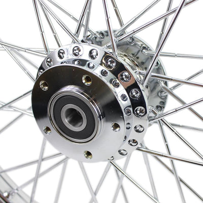 A close up image of a Moto Iron® Chrome Front 40 Spoke Wheel 21 "x 2.15" (fits Harley FXD 2000-03,Sportster 2000-07) Billet Hub motorcycle wheel.