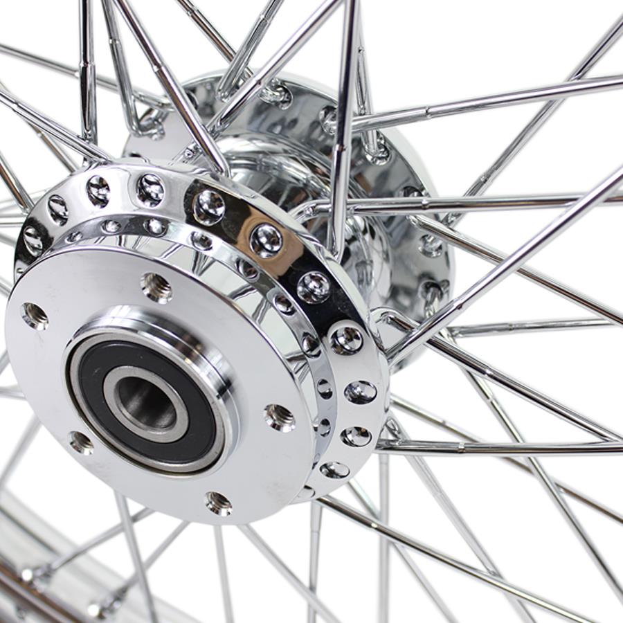 A close up image of a Moto Iron® chrome front wheel with 40 spokes on a motorcycle.
