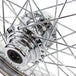 A Moto Iron® 16” × 3” chrome spoked front wheel for 1984-1999 Harley-Davidson Big Twin and Moto Iron Springers, showing the hub, spokes, and rim in detail, viewed from the front.