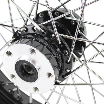 A close up of a Moto Iron® Black Rear 40 Spoke Wheel 16 "x 3" on a white background, specifically for Harley models.