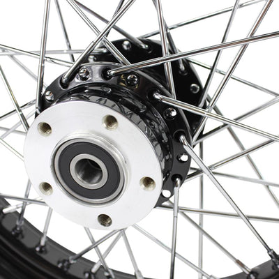 A close up of a Moto Iron® Black Rear 40 Spoke Wheel 16"x3" (fits Harley FLT 00-01, FXST 00-07, Dyna 00-05, Sportster 00-04) with a billet hub on a white background.
