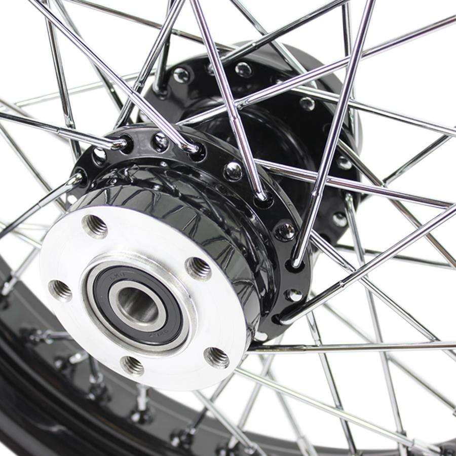 A close up of a black Moto Iron® Black Rear 40 Spoke Wheel 16"x3" (fits Harley FLT 00-01, FXST 00-07, Dyna 00-05, Sportster 00-04) with a billet hub on a white background.