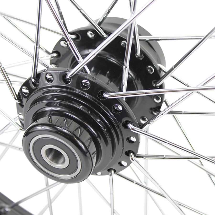 A close up of a Moto Iron® Black Front 40 Spoke Wheel 21"x2.15" (fits Harley Softail 2000-2006, Dyna FXDWG 2000-2005) on a white background.