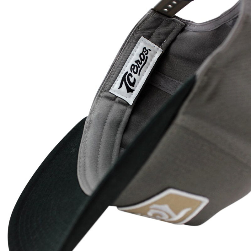 A TC Bros. Shield Snapback Hat - Charcoal/Black with a TC Bros logo on it.