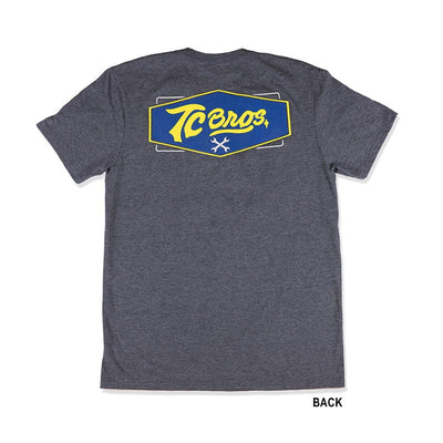 A TC Bros. Shield T-Shirt - Charcoal Heather with a TC Bros logo.