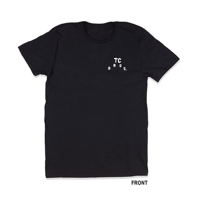 A black TC Bros. Devil T-Shirt with a white logo on it.