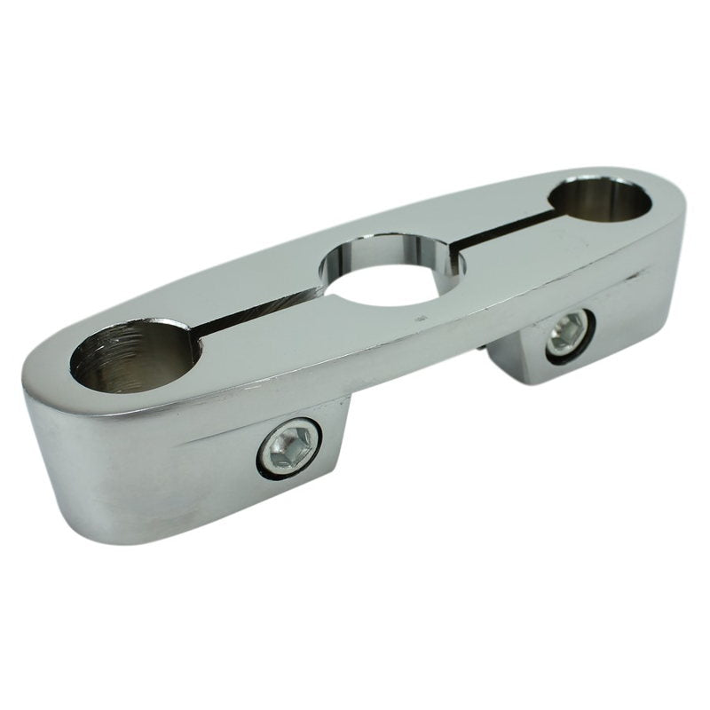 A Moto Iron® Top Triple Clamp for Springer Front Ends, a metal object with holes.