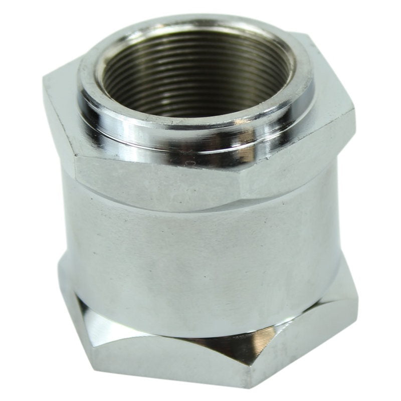 A metal object with a Moto Iron® Hex Retainer Nut for Springer Front Ends.