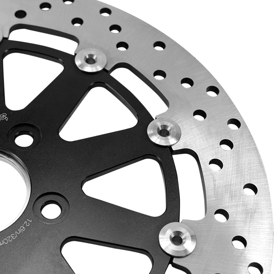 A TC Bros. 12.6in Oversized Front Floating Brake rotor for Harley Models, showcasing its corrosion resistance, placed against a white background.