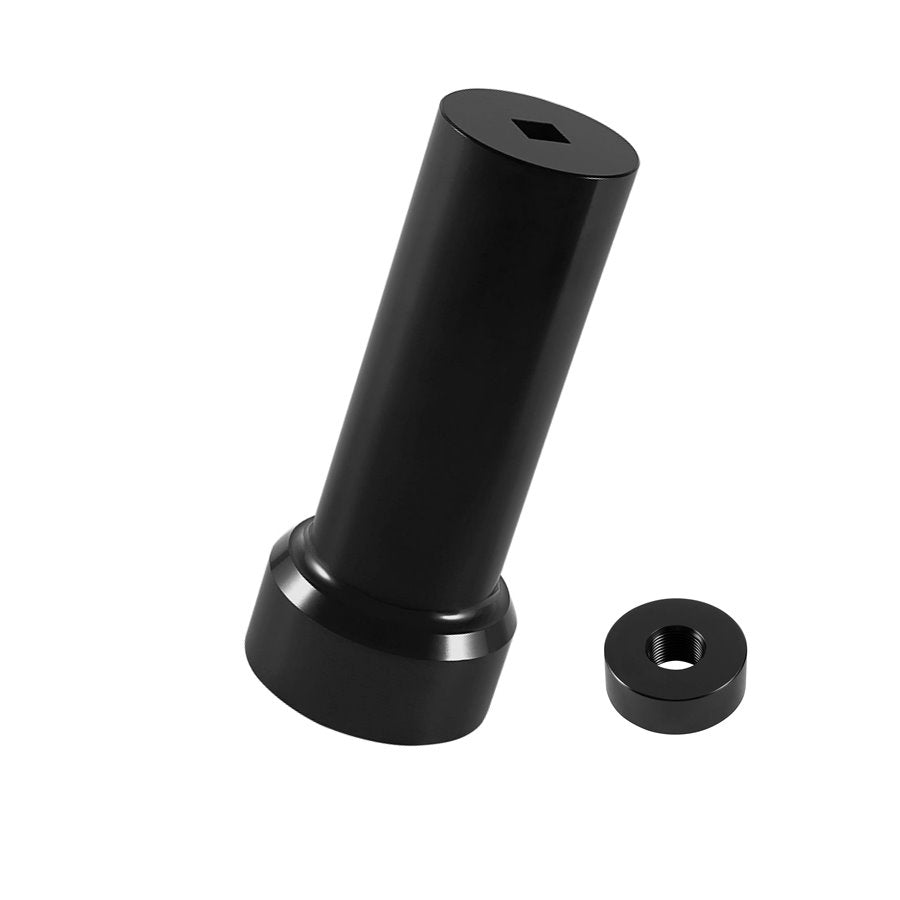 A black cylinder with a small hole in it, the Moto Iron® 2-1/4" Mainshaft Sprocket/Pulley Socket Tool for Twin Cam 06-17 Dyna, 07-19 Electra Glide & others.
