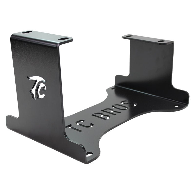A black metal TC Bros. Harley Big Twin Engine Stand bracket with the word tc on it.