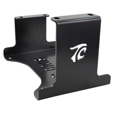 A TC Bros. metal bracket with the letter t on it.