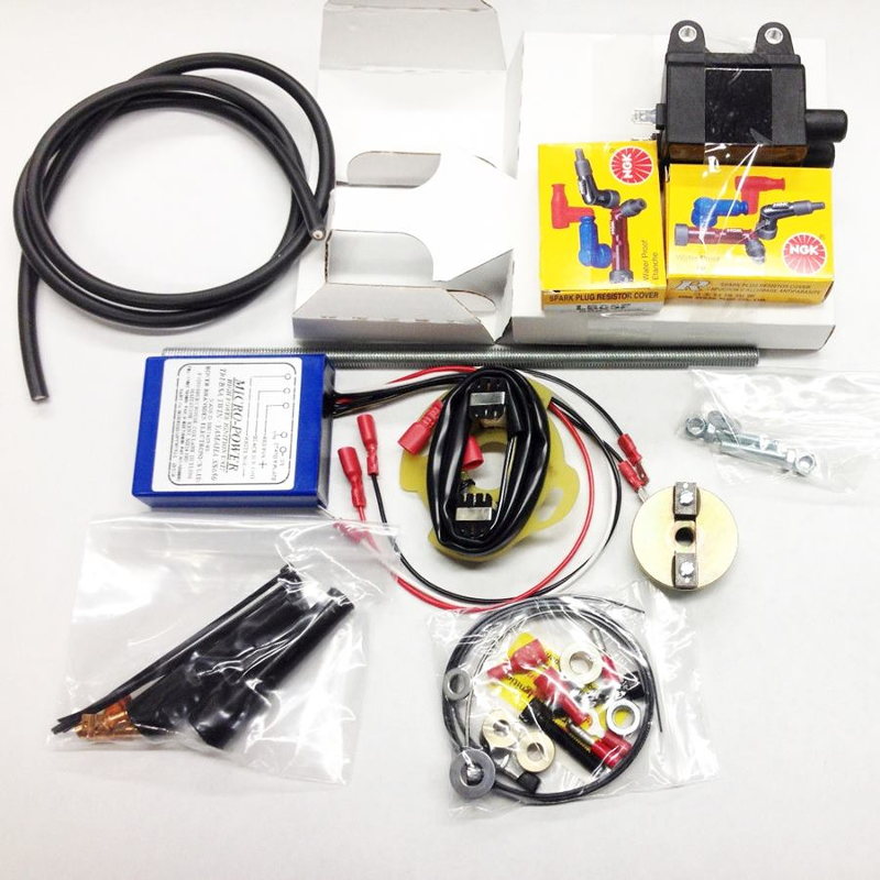 A box with a battery, wires, and Boyer Bransden Micro Power Digital Ignition System Yamaha XS650.