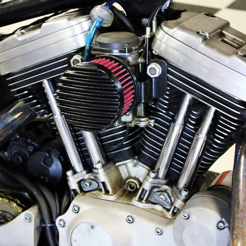 Harley-Davidson motorcycle with a TC Bros. Finned Black Air Cleaner S&S Super E & G Carbs, exuding vintage style.