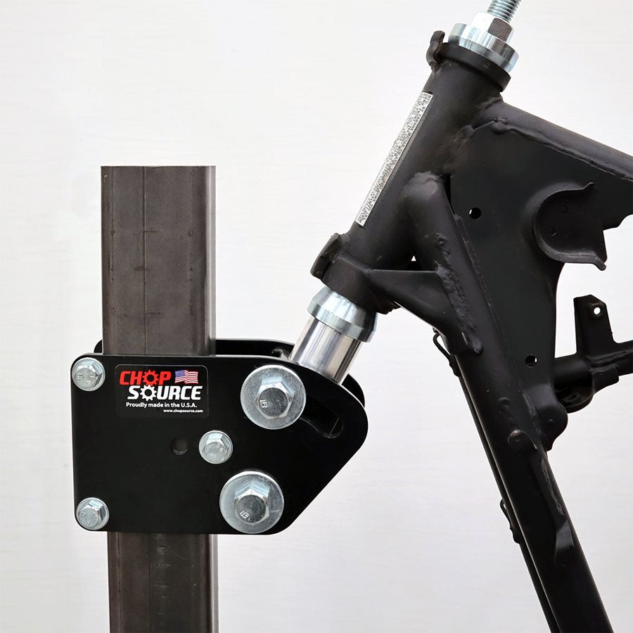 A metal bracket attached to a DIY Motorcycle Frame Jig Kit By Chop Source (Great for Chopper and Bobber Frame Building).
