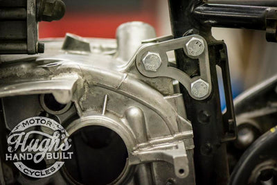A close up of the Hughs HandBuilt XS650 Motor Mount Kit (74-Up) motorcycle engine.