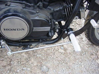 A TC Bros. Honda Magna V65 Forward Controls Kit motorcycle with a handlebar on it.