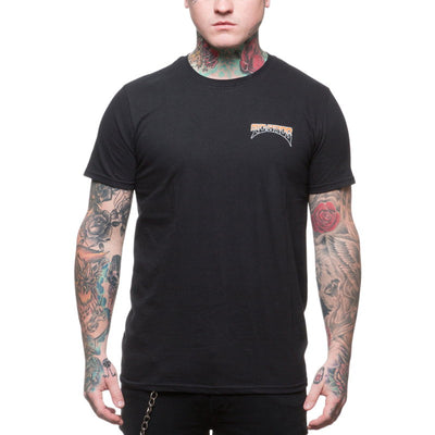 A man wearing a TC Bros. Drifter T-Shirt - Black, with tattoos.