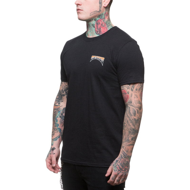 A man wearing a TC Bros. Drifter T-Shirt in black, adorned with tattoos.