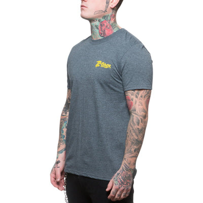 A man wearing a TC Bros. Shield T-Shirt in Charcoal Heather.