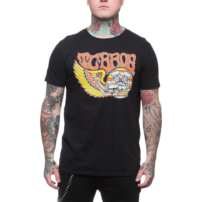 A man with tattoos wearing a TC Bros. Wing T-Shirt - Black.