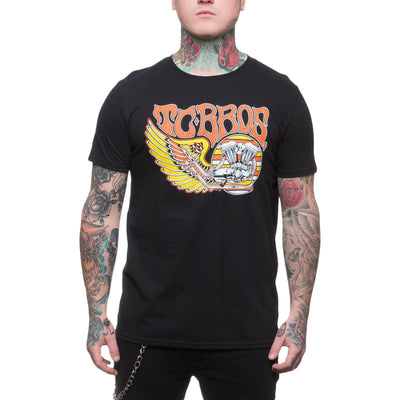 A man with tattoos wearing a TC Bros. Wing T-Shirt - Black.