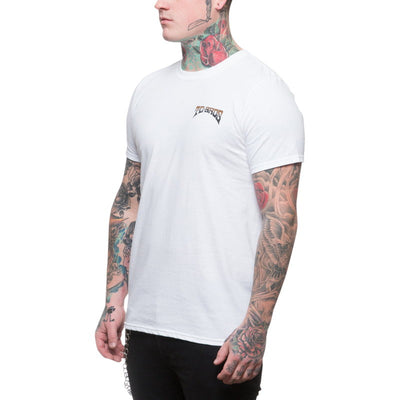 A man with tattoos wearing a TC Bros. Drifter T-Shirt - White.