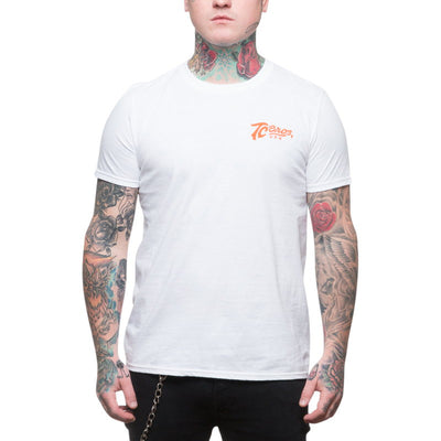 A man wearing a TC Bros. Classic T-Shirt - White and tattoos, TC Bros., in a white t-shirt.