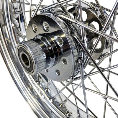 A close up of a Mid-USA Chrome Rear 40 Spoke Wheel 16"x3" (fits Harley Ironhead Sportster XL 1955-1978) and spokes, built to OEM specs.