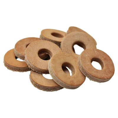 A pile of TC Bros. Leather Cushion Washers with 3/8 inch Hole 10 pack on a white background.