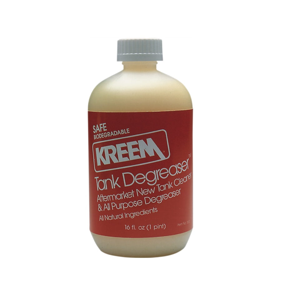 A bottle of Kreem New Tank Cleaner/Degreaser, made with natural ingredients, on a white background.