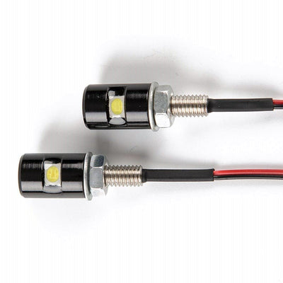 A pair of Moto Iron® LED License Plate Lights/Bolts lights on a white background.