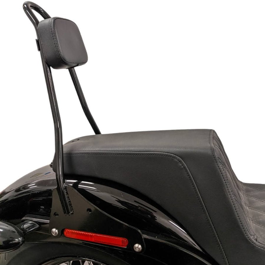 The back of a black motorcycle with a seat and TC Bros. Clamp On Sissy Bar Pad.
