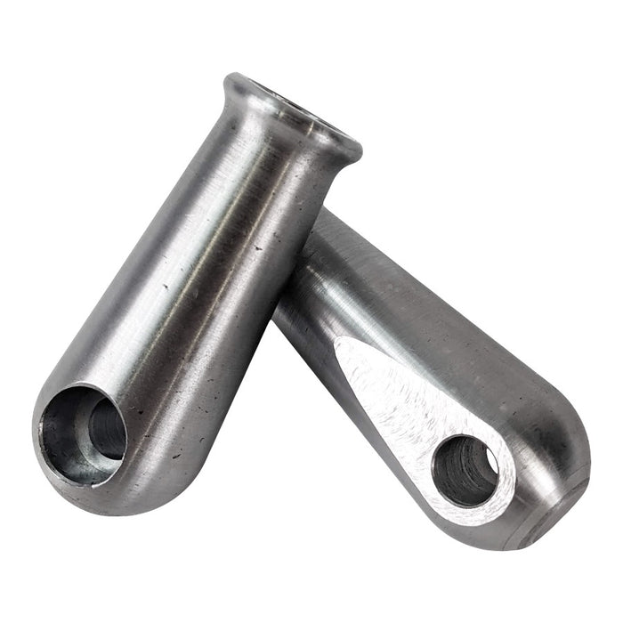 Two TC Bros. Sissy Bar/Fender Strut Mounting Bungs, cylindrical with holes at one end, are positioned crossing each other on a white background.