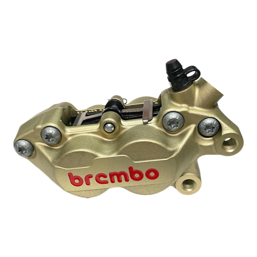 A Brembo P4 Axial Brake Caliper Right Side Gold 4 Piston on a white background.