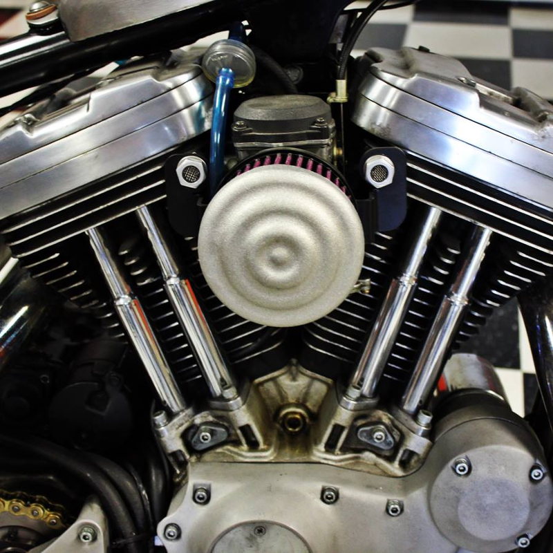 TC Bros. Ripple Raw Air Cleaner for Harley-Davidson motorcycle with vintage style and an air cleaner.