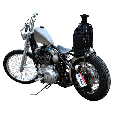 A black motorcycle with a TC Bros. Original DIY Sissy Bar Kit attached to it.