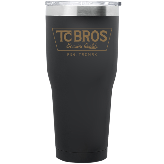 A TC Bros. 30 oz. Stainless Steel Tumbler - Black (gold logo) with the word TC Bros on it.