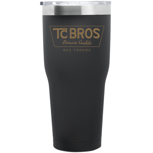 A TC Bros. 30 oz. Stainless Steel Tumbler - Black (gold logo) with the words TC Bros on it, made of stainless steel.