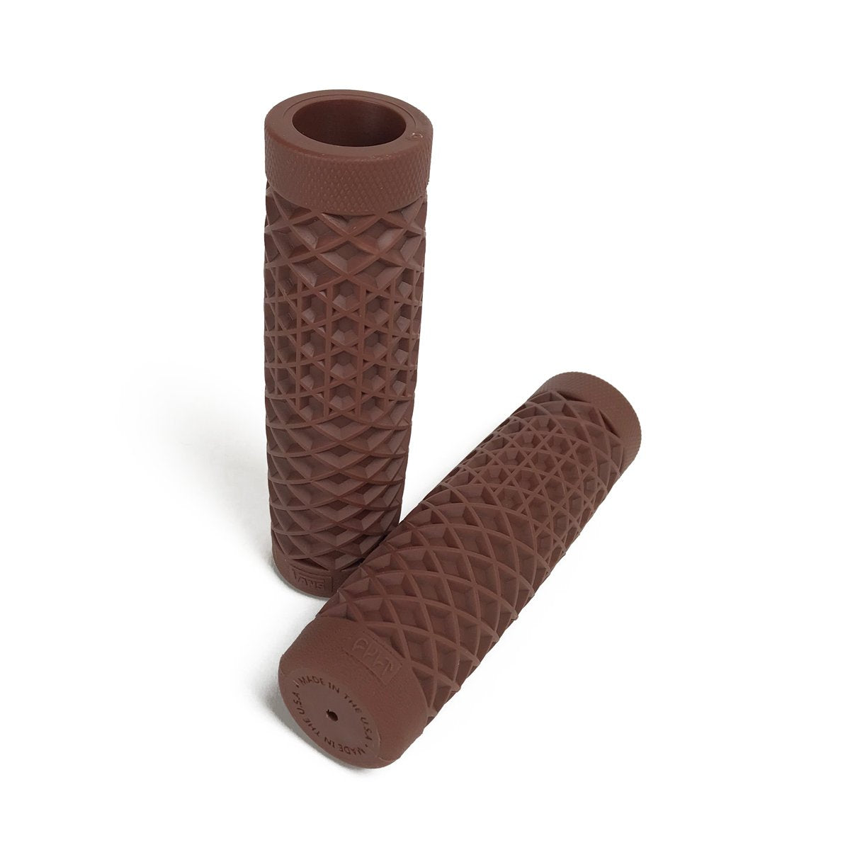 A pair of Vans + Cult Motorcycle Grips - 7/8" Brown on a white background.