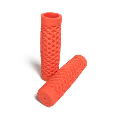 A pair of Vans + Cult Motorcycle Grips - 7/8" Orange by ODI on a white background.
