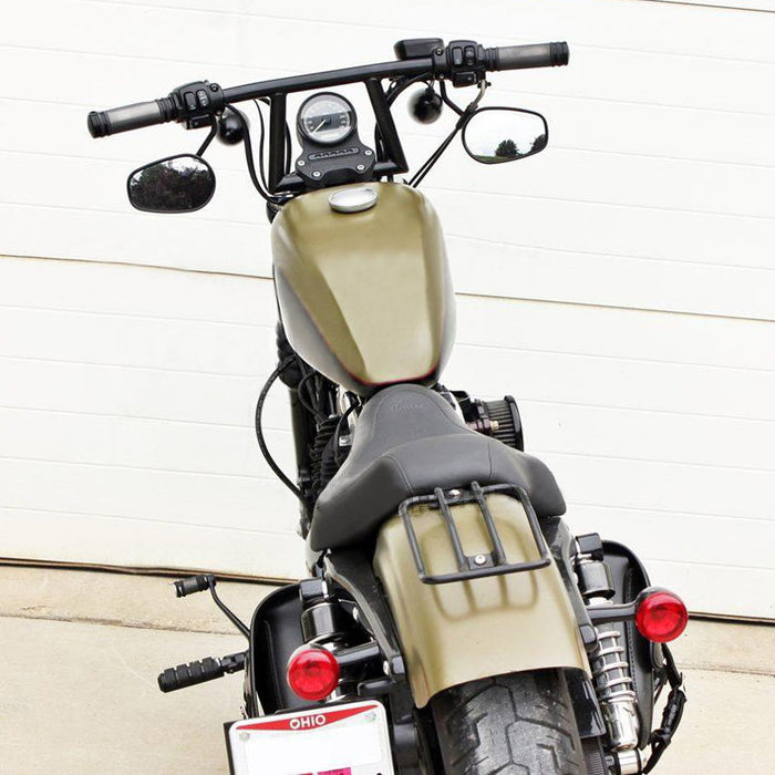 Two TC Bros. 1" Window Handlebars, one chrome and one black, featuring a distinctive rectangular center design inspired by TC Bros. Harley-Davidson styles, are displayed on a white background.