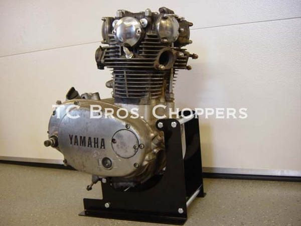 A TC Bros. Yamaha XS650 Engine Stand on display in a room.