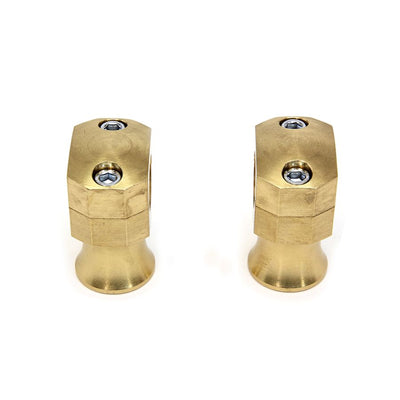 A pair of Wyatt Gatling 1" Diameter Shorty Style Brass Riser Sets with a white background.