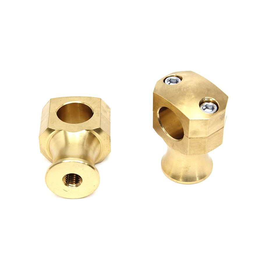 Two Wyatt Gatling brass fittings, including a 1" diameter Shorty Style Brass Riser Set, on a white background.
