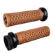 A pair of brown, patterned ODI Vans Lock-On V-Twin grips with black end caps and a Lock-On Grip System.